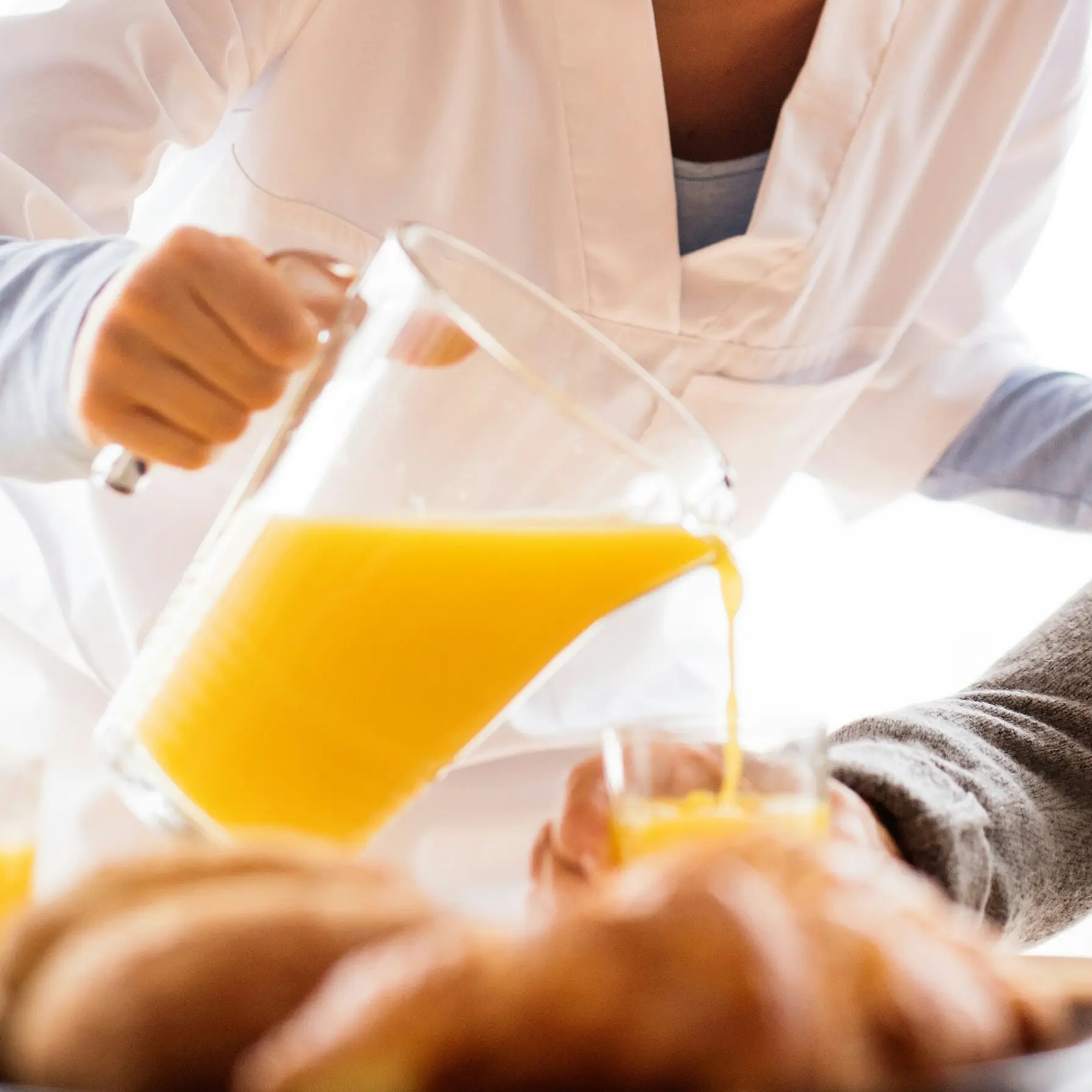 Pouring juice into a cup