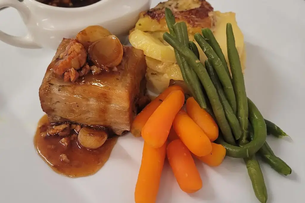 Orange Marinated Pork Belly with Chorizzo and Silverskin Onion Gravy